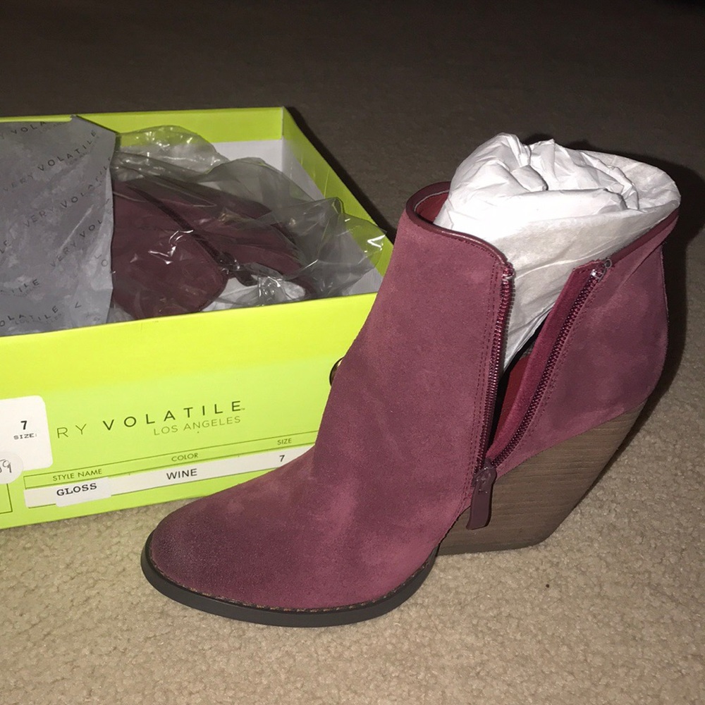 Volatile maroon booties. Brand new, still in box.